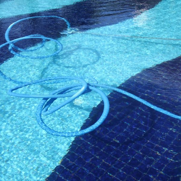 Pool cleaning pipe floating. Pool cleaning pipe floating.